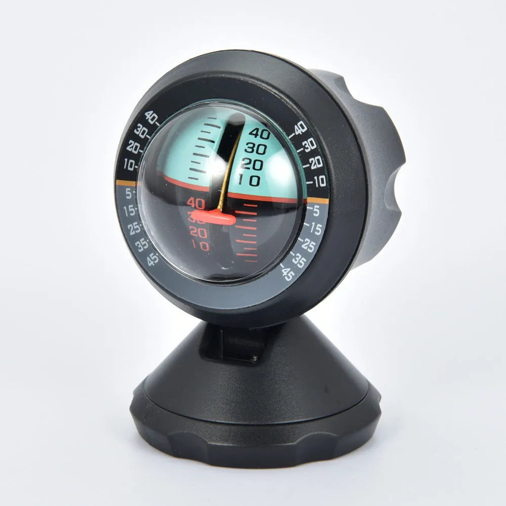 Black vehicle mounted slope meter on dashboard showing inclination measurement