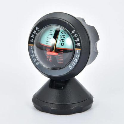 Black vehicle mounted slope meter on dashboard showing inclination measurement