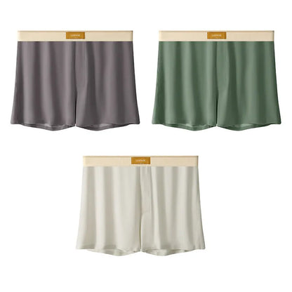 Men's loose-fit Ice Silk nylon underwear in a three-pack, showing colour options like black, green, and grey.