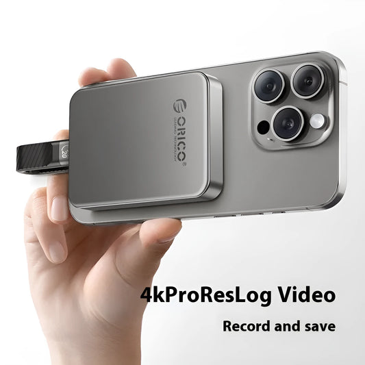 Grey magnetic mobile solid state drive with ultra-thin design and magnetic suction ring for phones and computers