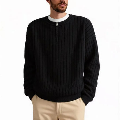 Men's grey half-zip pullover sweater with textured knit and loose fit, showing front view with zip partly open.
