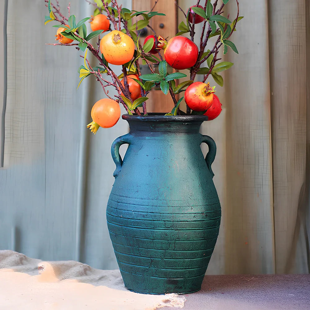 Ceramic mosaic vase with dried flowers, showing mosaic pattern and 25cm height