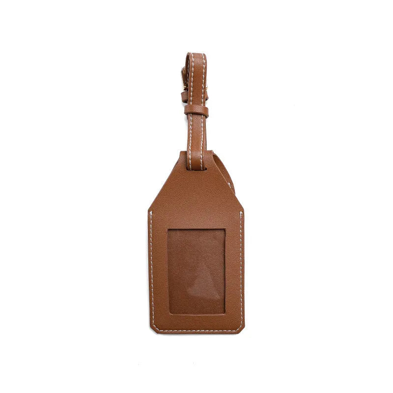 Luggage tag location tracker protective cover made from PU/PVC material in a solid colour design available in black, brown, or orange options to shield your electronic tracker while travelling.