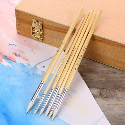 Six wooden pen brushes with pointed hook line design and wool bristles arranged together