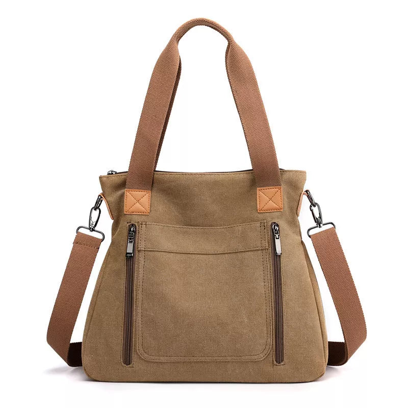 Women's canvas shoulder bag in various colors with large capacity and zipper closure
