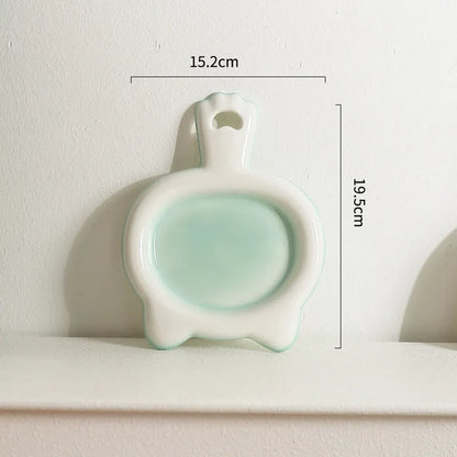 Ceramic cat bowl in blue colour with shallow mouth design for pet food and water.