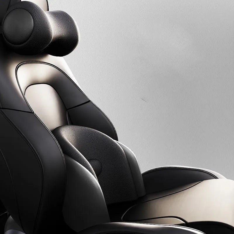 Black car massage cushion with adjustable straps attached to a car seat headrest