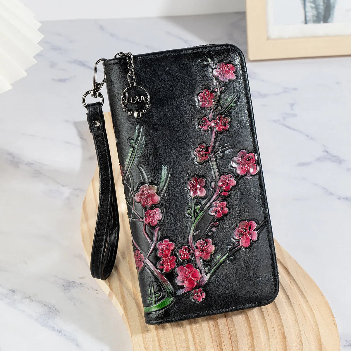 PU leather handbag with embossed floral pattern and zipper closure in Chinese style