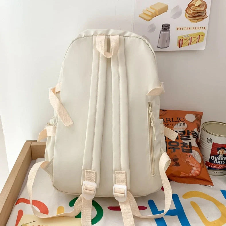 Girls' backpack with 29×12×40cm dimensions in black, white, green, and pink colour options