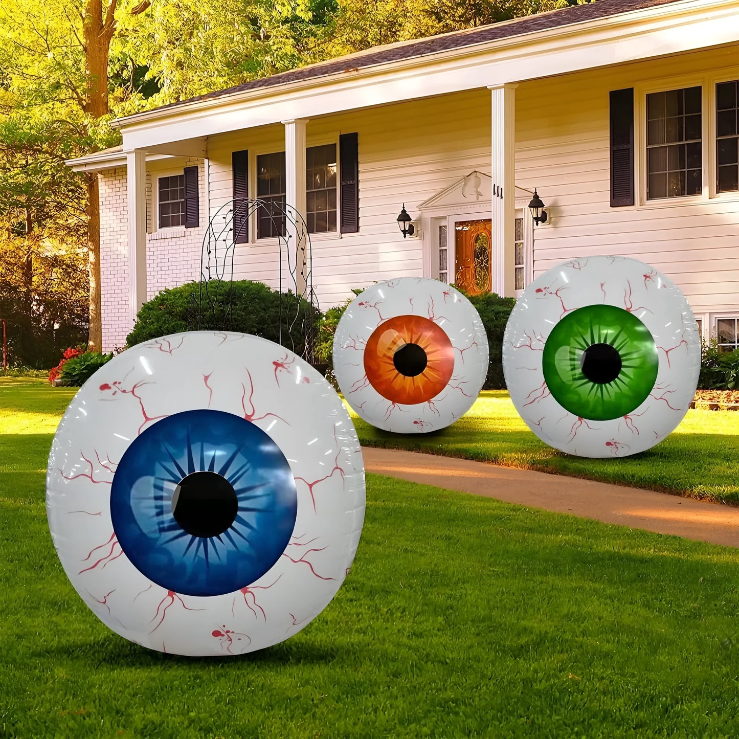 Green Halloween eyeball balloon with red bloodshot pattern, inflated to 40cm diameter.