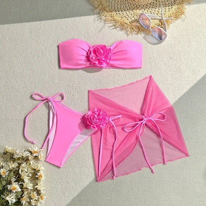 Women's pink tube top swimsuit with three-dimensional flower tie, matching pants and skirt for swimming