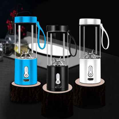 Hand operated portable blender in black, white, blue, and rose red with rechargeable battery and 530ml capacity