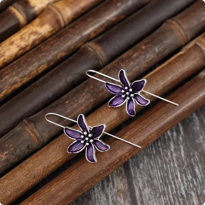 Purple flower-shaped alloy earrings with electroplated finish and post fastening