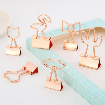 Golden decorative metal clip with 5.5cm length and 2.5cm tail in bow, cactus, cat, flamingo, or love design