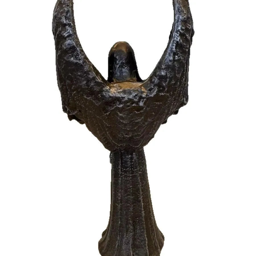 Dark Angel resin statue ornament measuring 6.5 by 5 by 17 centimetres on a wooden surface.