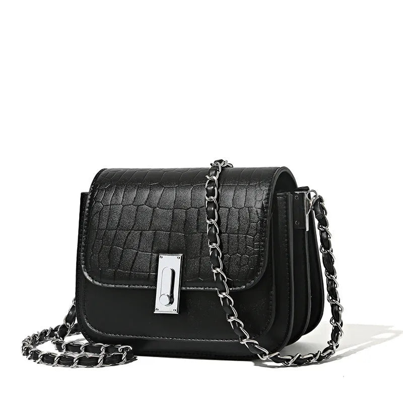 Women's soft PU shoulder bag with chain strap, horizontal square design in black colour showing sandwich pocket