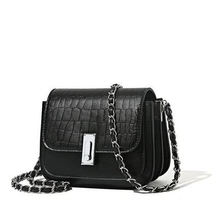 Women's soft PU shoulder bag with chain strap, horizontal square design in black colour showing sandwich pocket