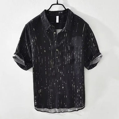 Loose-fit short-sleeved polo shirt with lapel collar in white and black colour options
