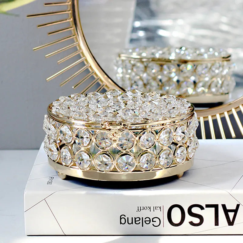 French gold iron jewellery box with crystal glass panels showing jewellery inside