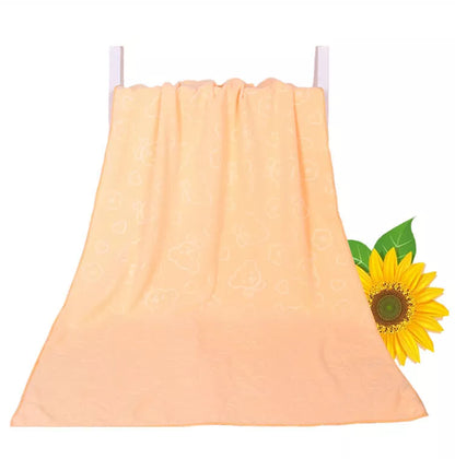 Bear embossed microfiber bath towel in vibrant colors, quick-drying and soft