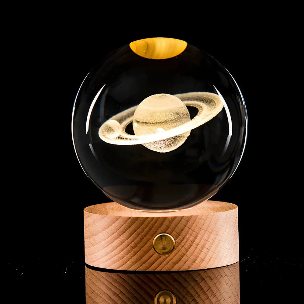 Transparent crystal ball with 3D laser inner carving of galaxy patterns on charging base