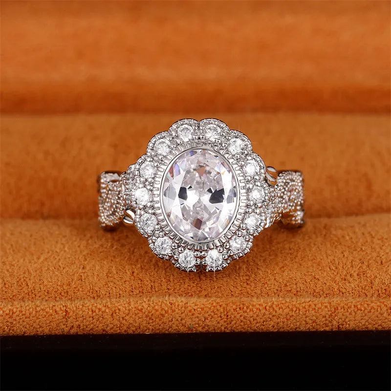 Geometric copper ring with round zircon stone in white gold colour plating.