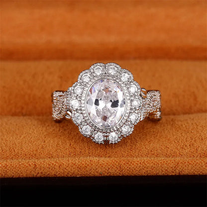 Geometric copper ring with round zircon stone in white gold colour plating.