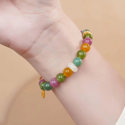 Tourmaline rainbow colour half bracelet with electroplated finish showing natural stone texture and partial wrist coverage design