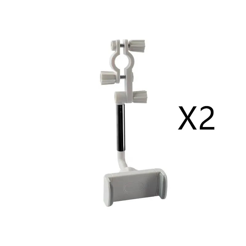 Black ABS plastic mobile phone bracket mounted on a car rearview mirror.