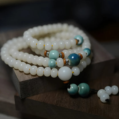 White jade bodhi seed bracelet with 108 flat round oblate beads