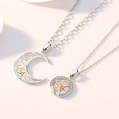 Sun Moon Tooth Couple Necklace showing electroplated copper pendants on 45cm cross chain