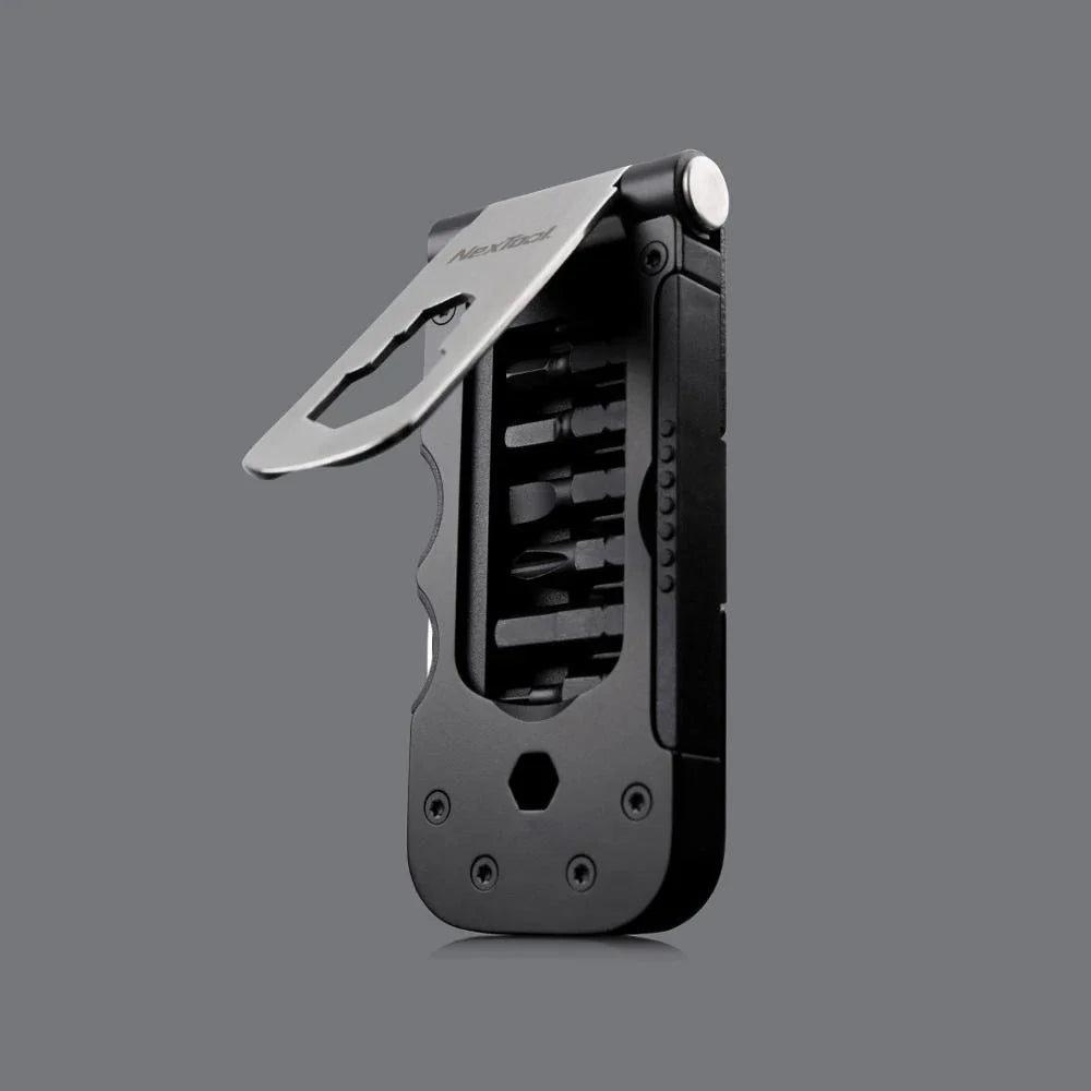 Compact, multi-function bicycle repair tool with wrench, tire spoon, and venting cap tools