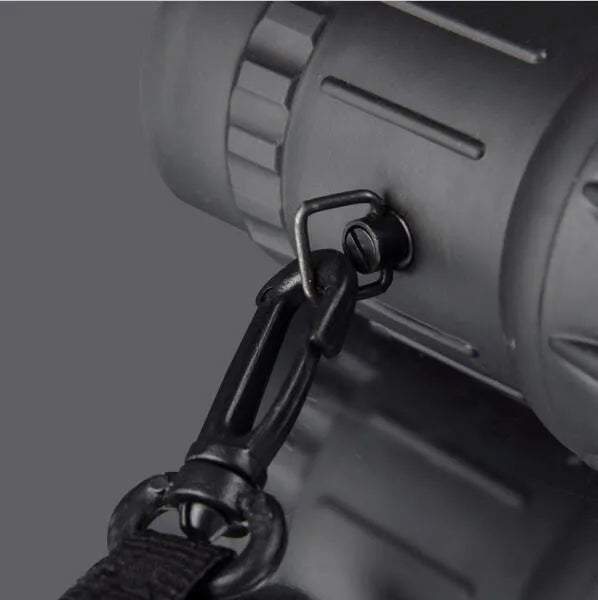 Black 16x52 high-power monocular with 52mm objective lens and textured grip