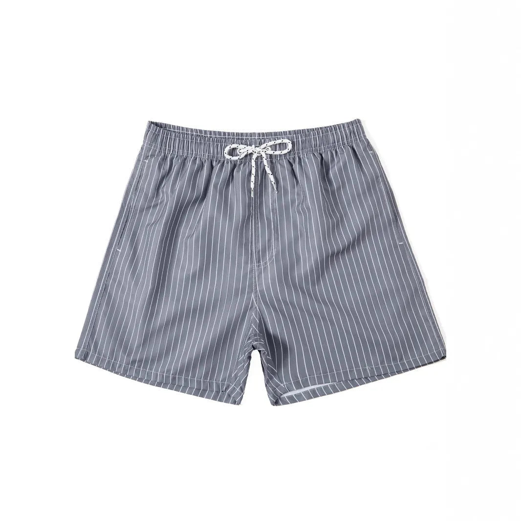 Pair of grey striped polyester shorts with a straight leg cut on a mannequin