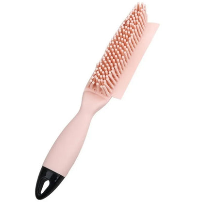 Green silicone pet grooming brush with flexible bristles for removing hair from cats, dogs and furniture
