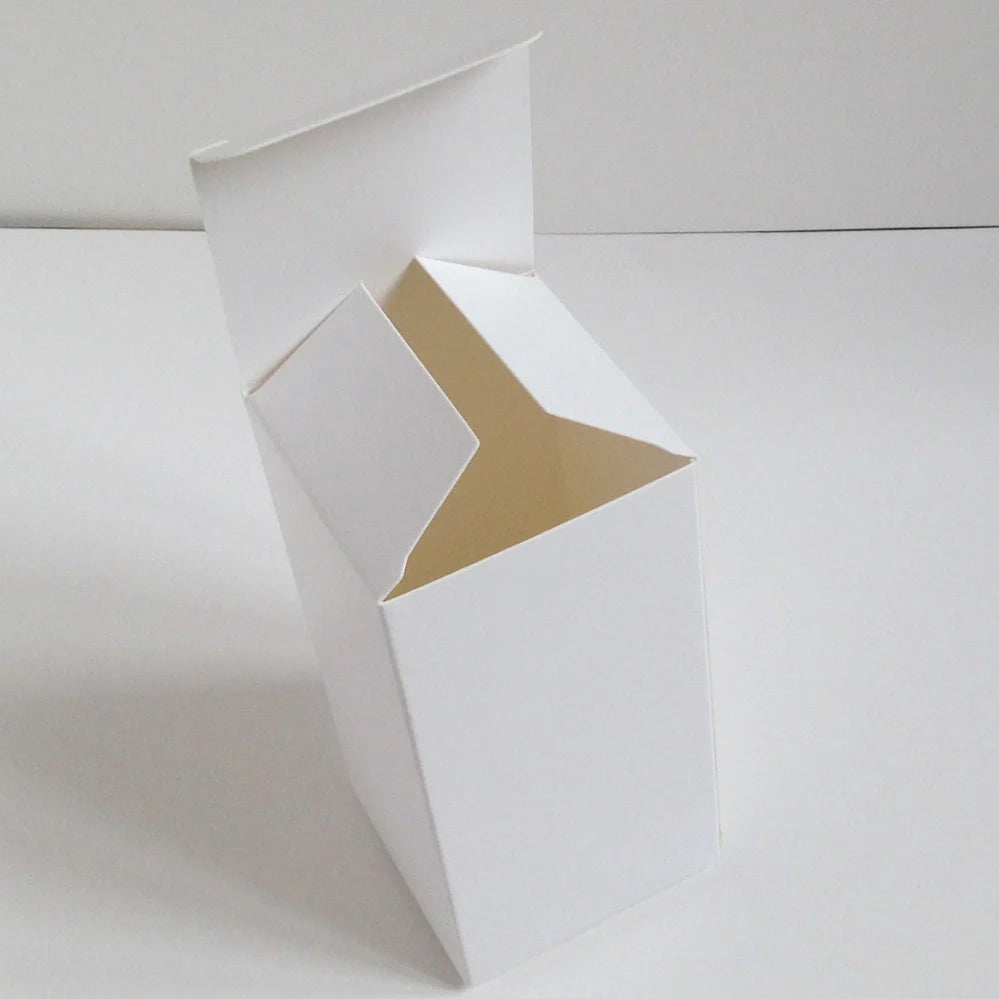 White paper storage boxes showing size variations from 3x3cm to 10x10cm base with different height options