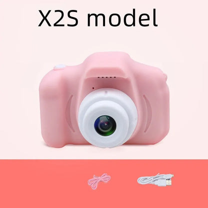 Colourful kids digital camera with silicone case showing 2-inch screen and lens.