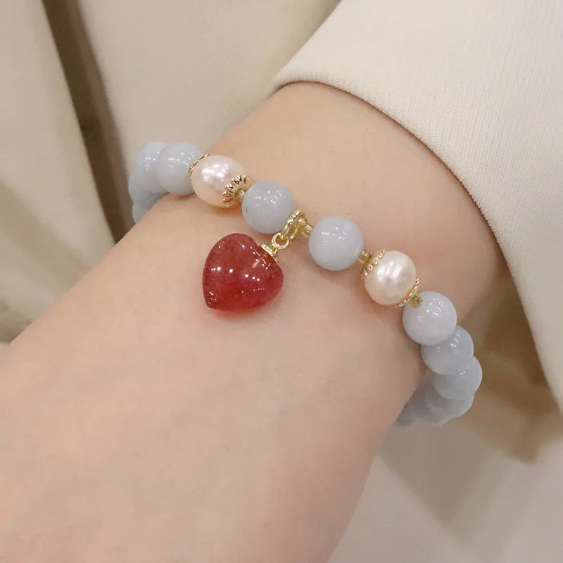 Gold plated women's bracelet with artificial crystal aquamarine chalcedony pendant in climbing cat design