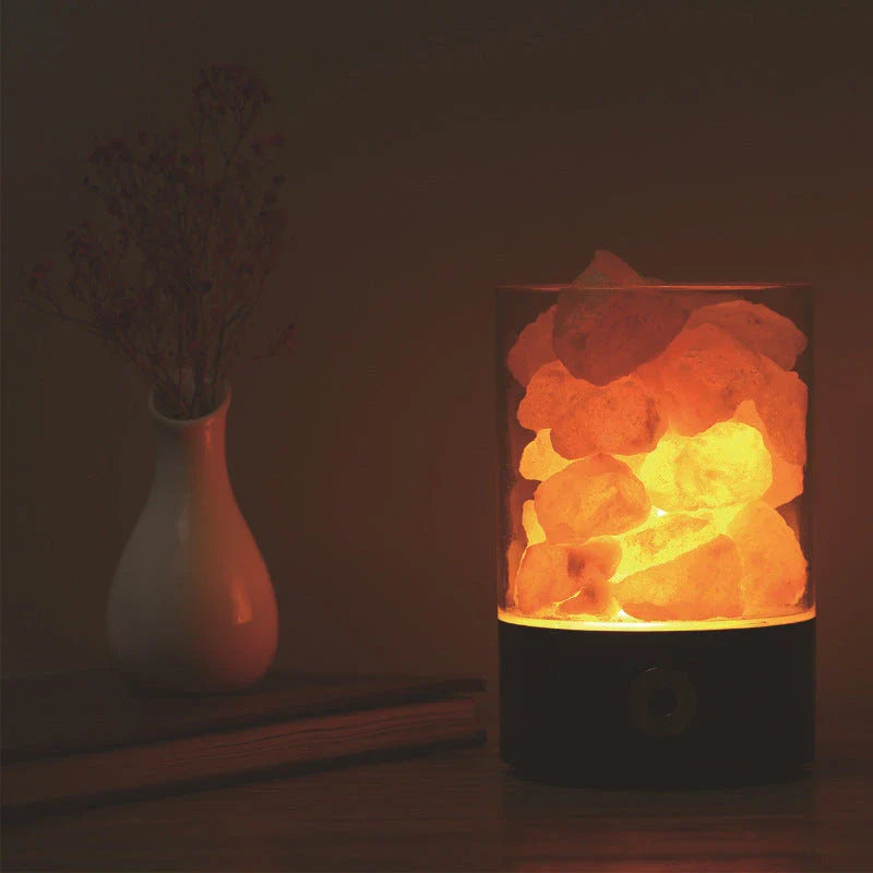 Himalayan salt lamp with warm, soothing glow and color-changing capabilities for air purification and relaxation