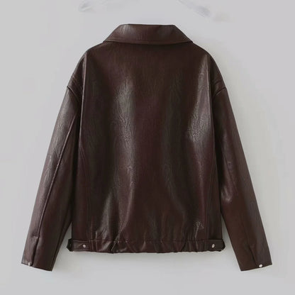 Stylish faux leather jacket with zip-up closure and lapel collar, available in burgundy and black colors
