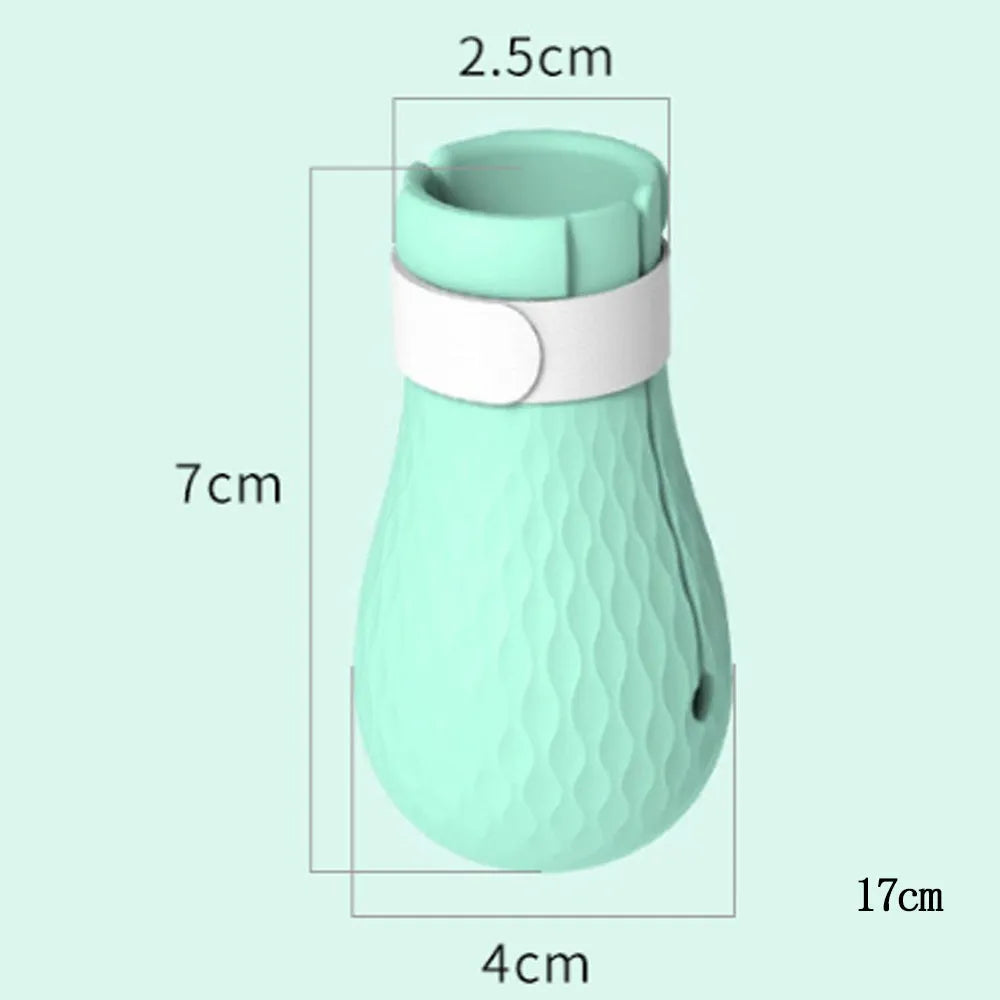 Four transparent green silicone cat paw covers for scratch protection during grooming and care