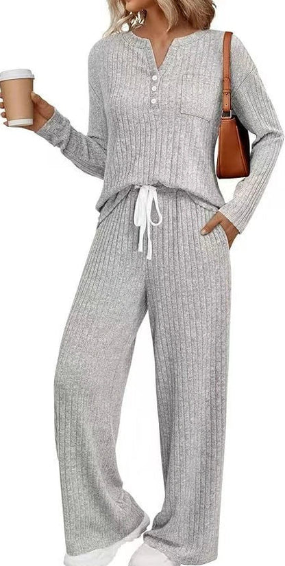 V-neck striped knit long coat with lace-up details and multiple pockets in light grey colour