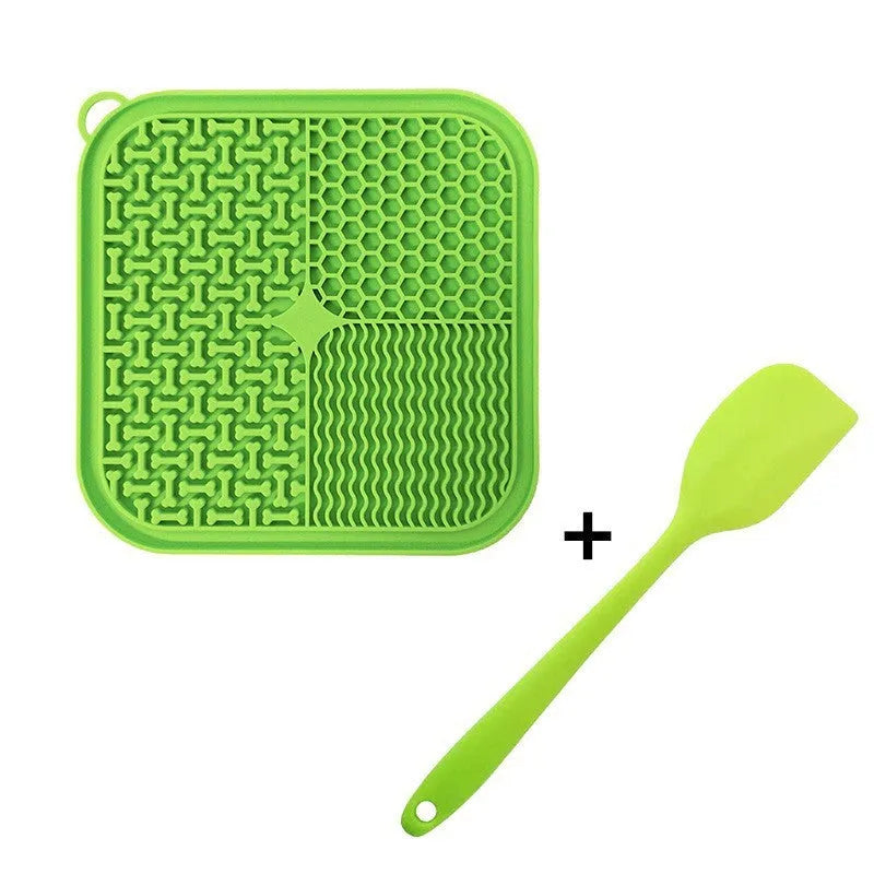 Orange, grey, blue, and green silicone dog licking mat with textured surface and suction cups