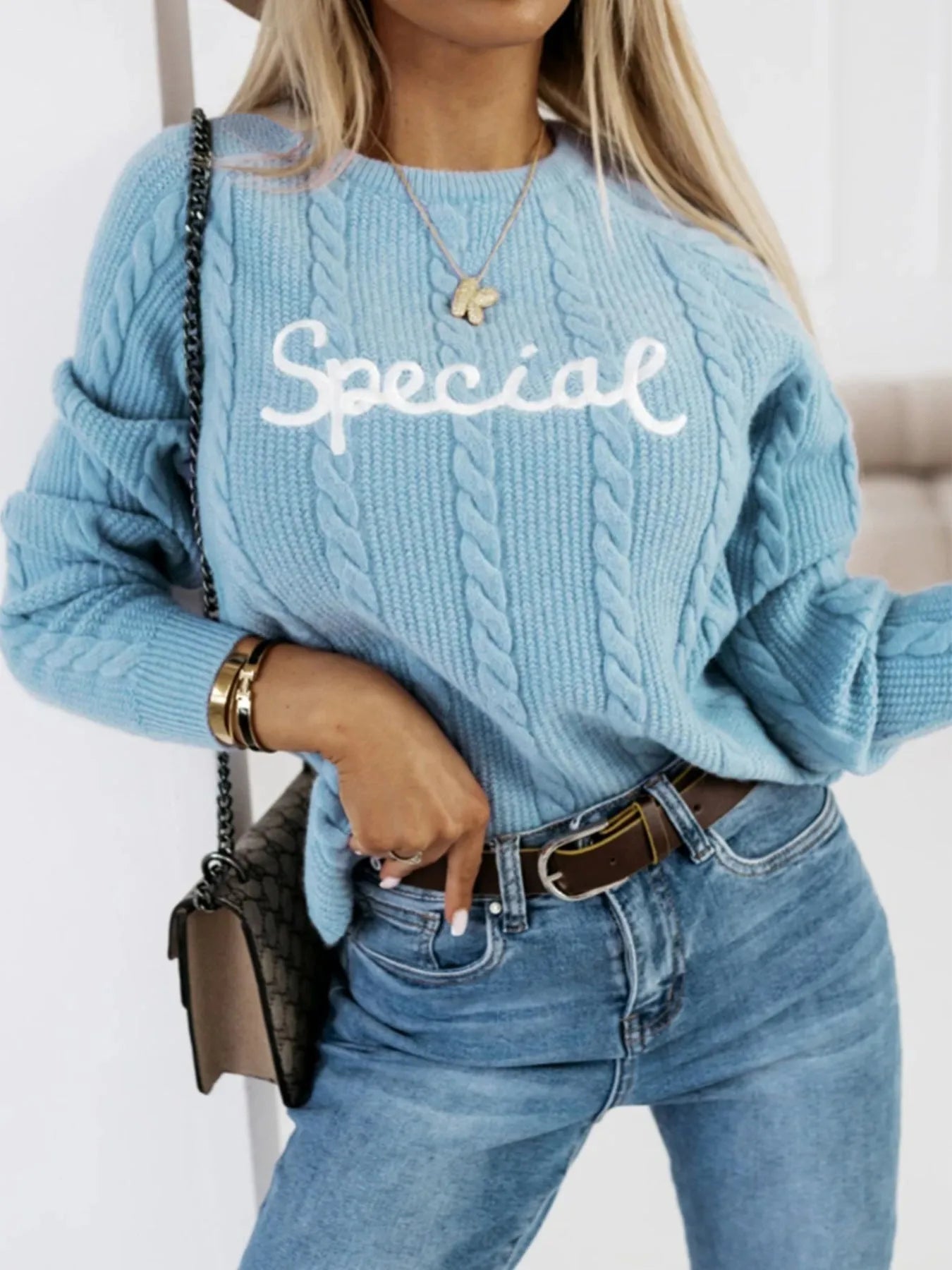 Blue leisure pullover with embroidered letters design and crew neck in core-spun yarn fabric