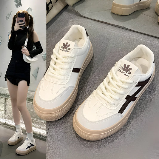 Blue and brown low-top casual sports shoes with round toe and flat rubber sole.