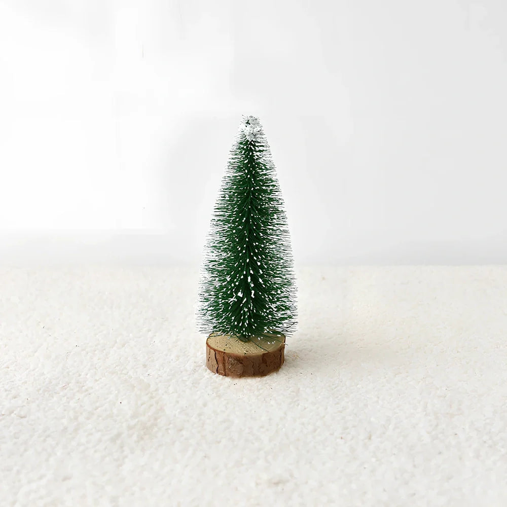 Mini Christmas tree with white snow flocking on green PVC branches, tabletop decoration
