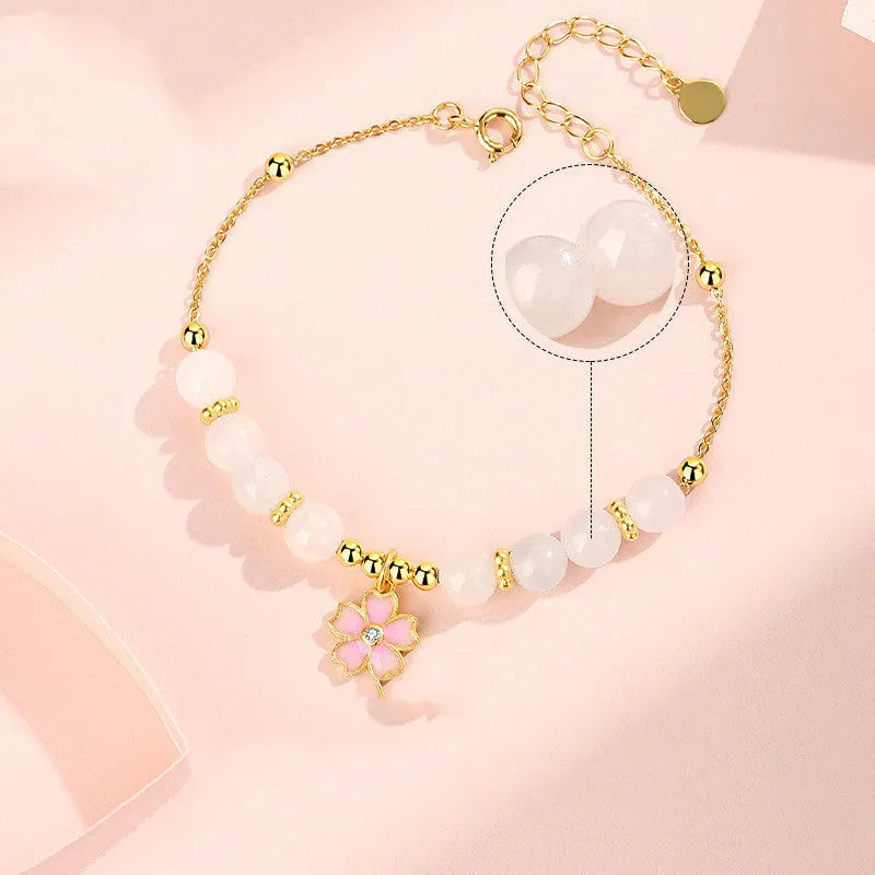Pink silver bracelet with cherry blossom pendant and Hetian jade beads