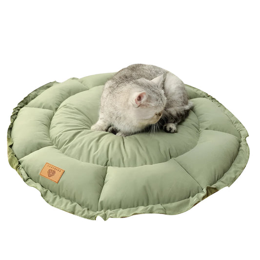 Reversible grey and green donut-shaped pet bed for cats and small dogs