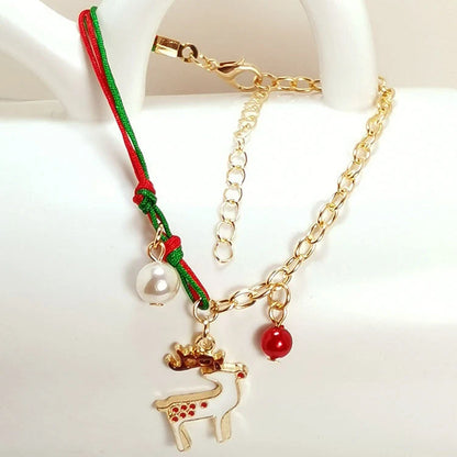 Charming Christmas bracelet with festive charms like Santa, snowmen, and snowflakes