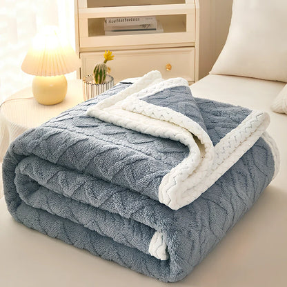 Double-thickened coral fleece sofa blanket in caramel colour showing dense texture and substantial thickness